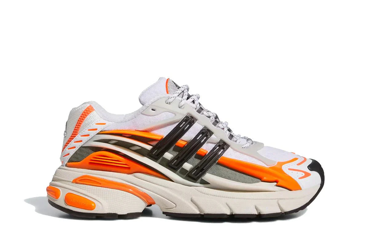 White, orange, and black chunky Adidas sneaker with bold color blocking and cushioned sole design.