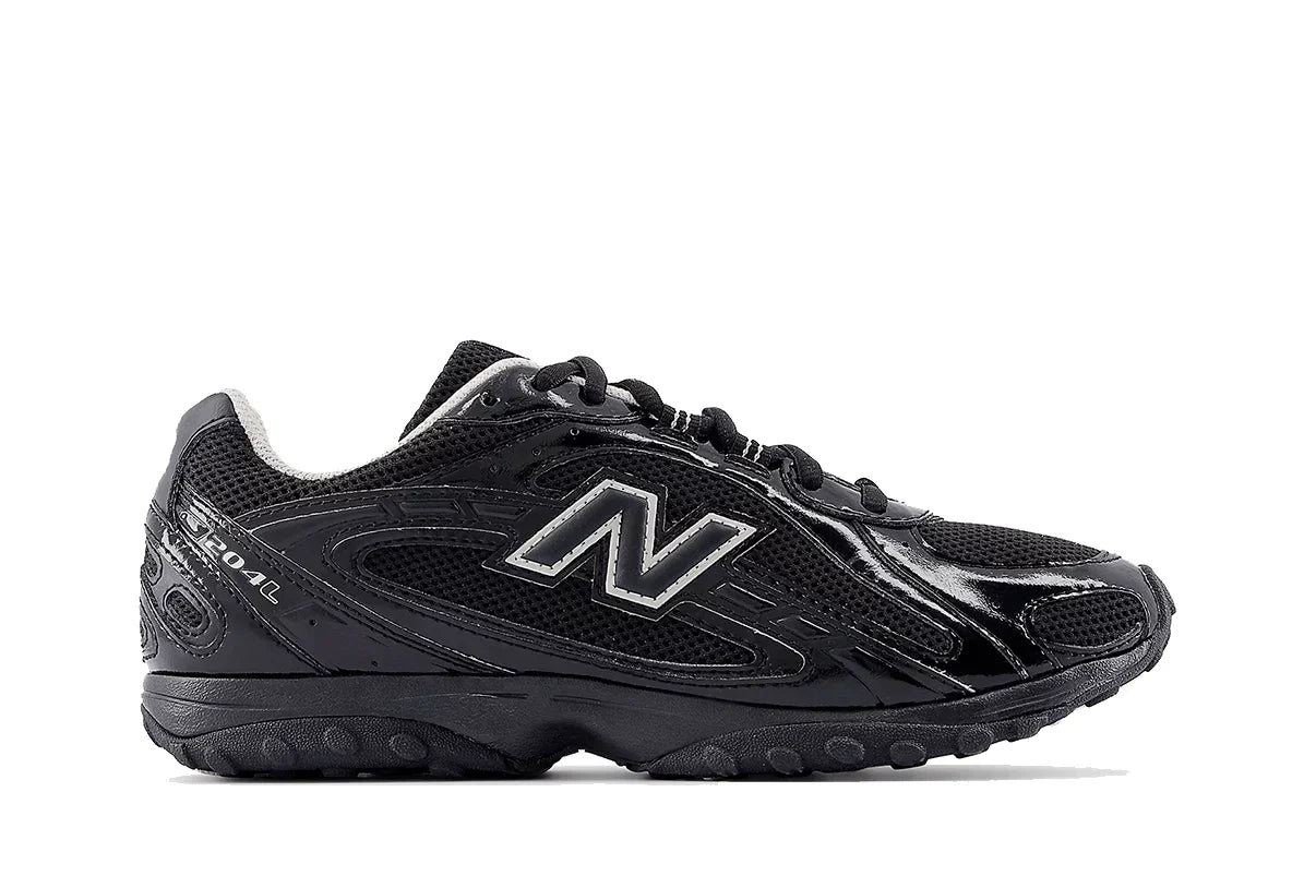 Tênis New Balance 204L Black Timberwolf Preto vista lateral