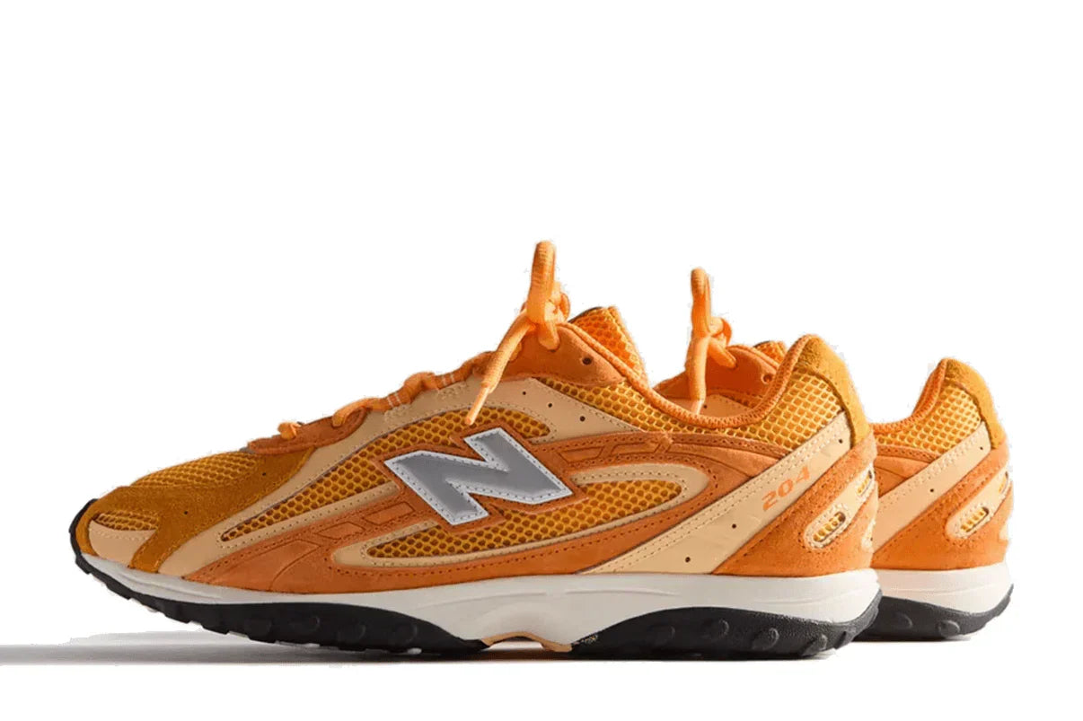 Tênis New Balance 204L Kith Orange Laranja detalhe lateral