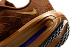Tênis Nike Vomero Premium Flat Stout Marrom detalhe lateral