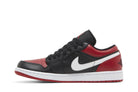 Tênis Air Jordan 1 Low Alternate Bred Toe Vermelho detalhe do solado