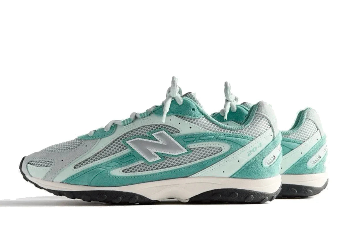 Tênis New Balance 204L Kith Green Silver Verde detalhe do solado