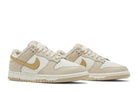 Tênis Nike Dunk Low Phantom Metallic Gold Dourado detalhe do solado